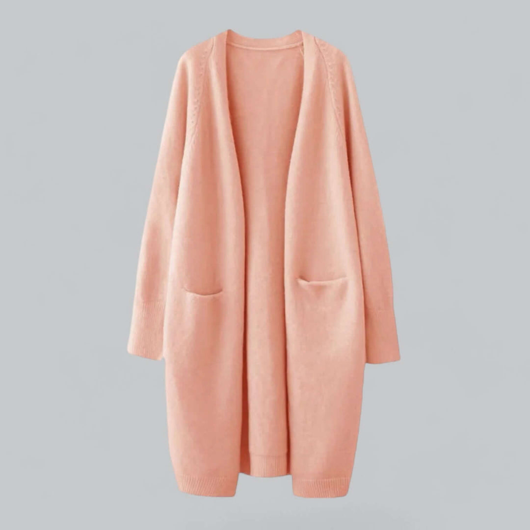 Long women's oversized cardigan sweater, providing extra warmth and a chic, relaxed look.