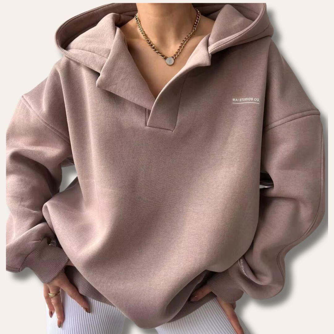 Versatile women's oversized pullover hoodie with notch neck, perfect for loungewear or stylish casual outfits.