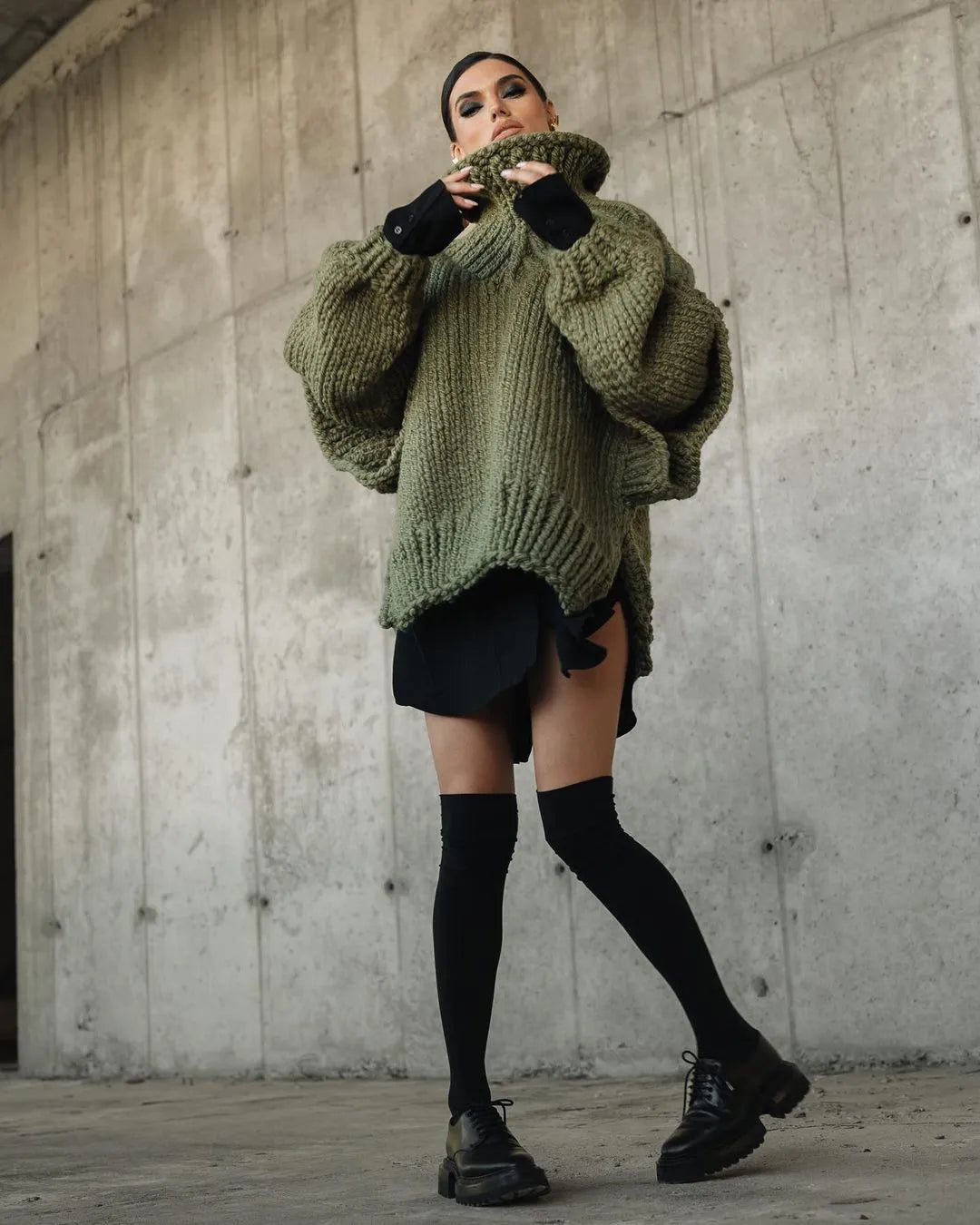 Fashionable oversized turtleneck mini dress for women, perfect for cozy fall and winter outfits.