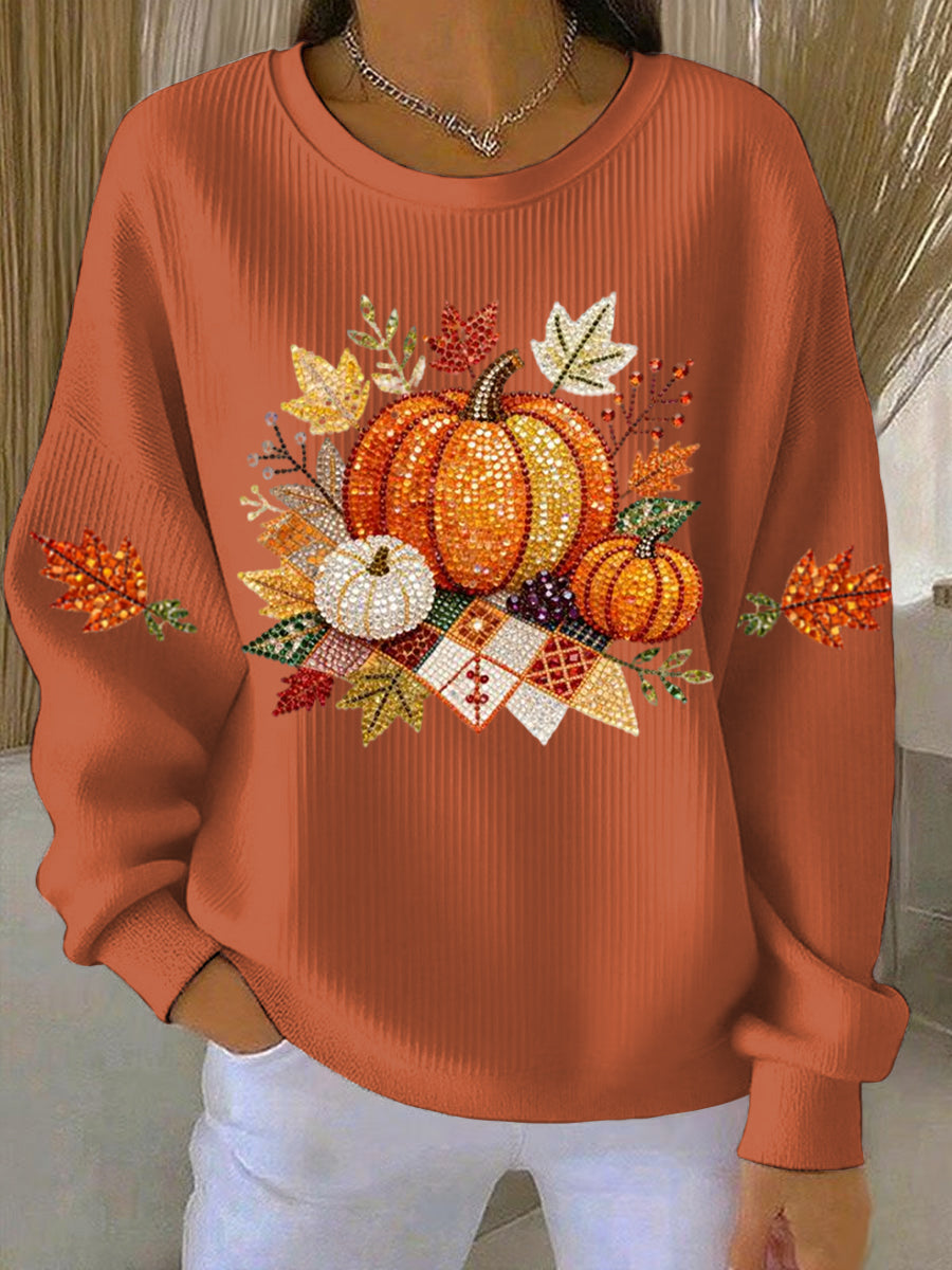 Women's cozy pumpkin graphic sweatshirt, perfect for fall fashion & seasonal wear.