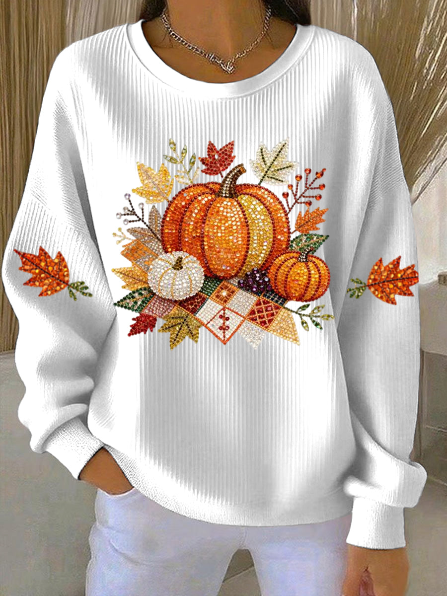 Stylish women's long-sleeve pumpkin graphic sweatshirt, ideal for autumn casual comfort.
