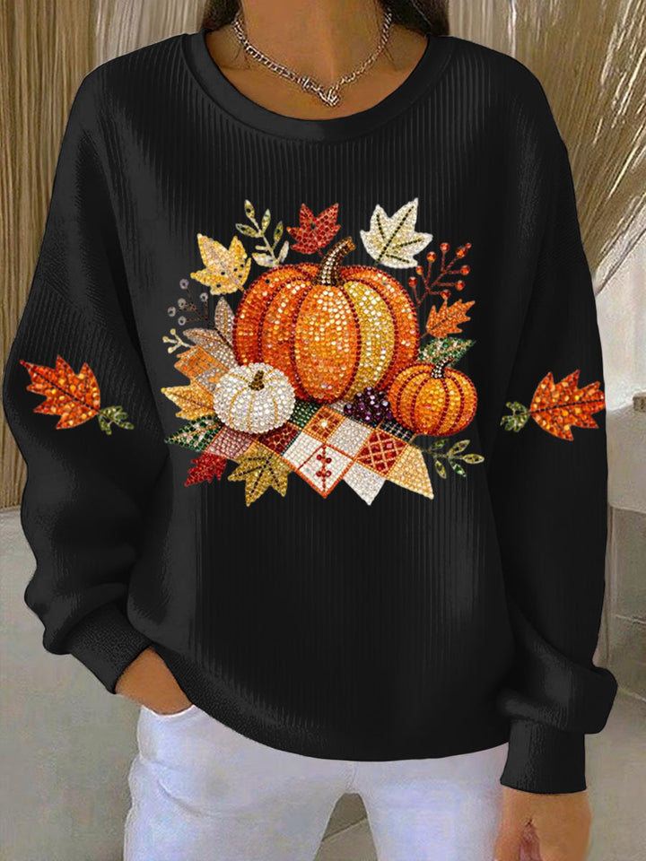 Cozy women's fall fashion sweatshirt featuring a vibrant pumpkin graphic. Great for everyday comfort.