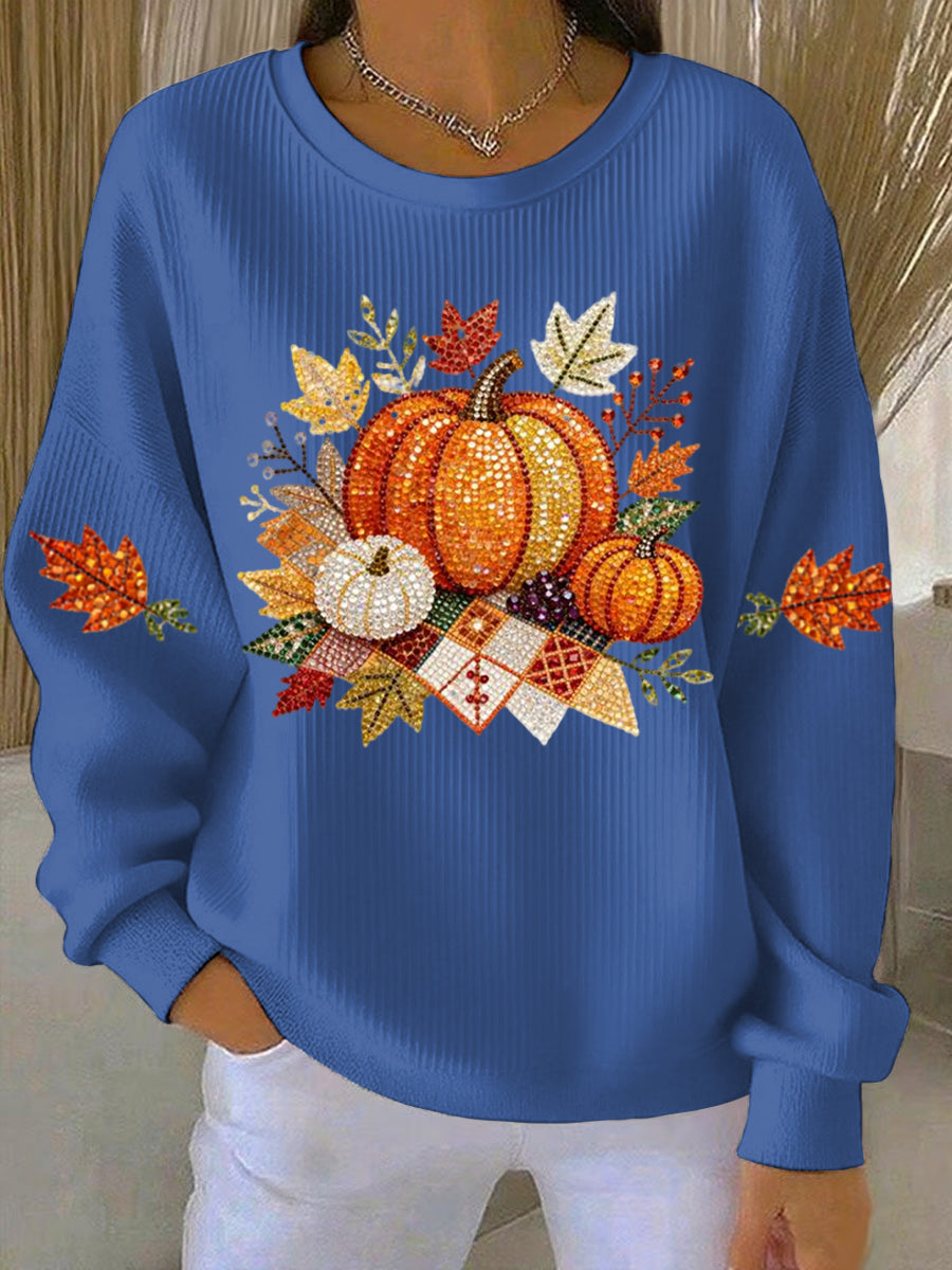 Comfortable women's graphic top with a charming pumpkin design, perfect for fall season casual wear.