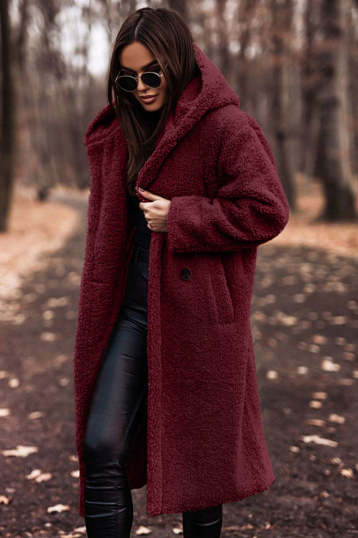 Warm women's casual hooded teddy coat, perfect relaxed fit outerwear for winter coziness.