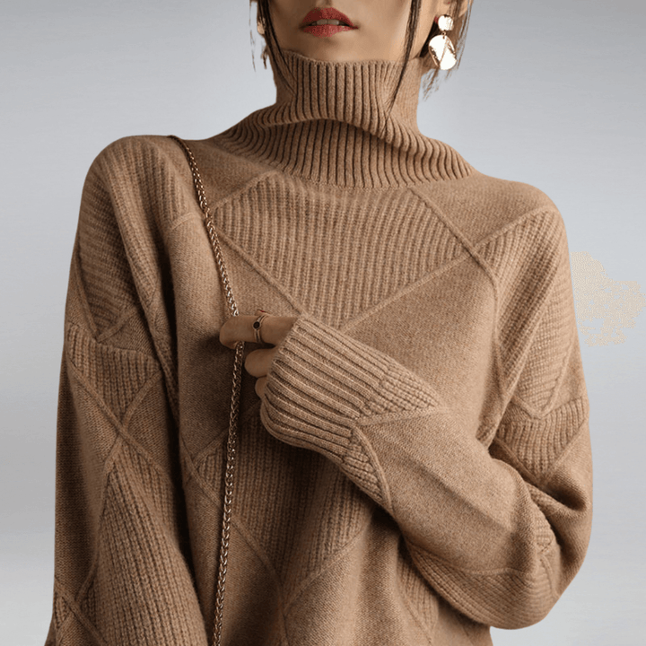 Elegant women's turtleneck sweater. Warm, relaxed fit pullover for versatile fall and winter fashion.