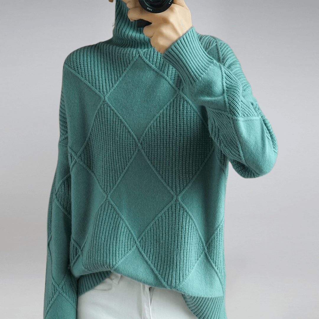 Relaxed fit women's turtleneck pullover. Soft, cozy knit sweater for comfortable everyday wear.