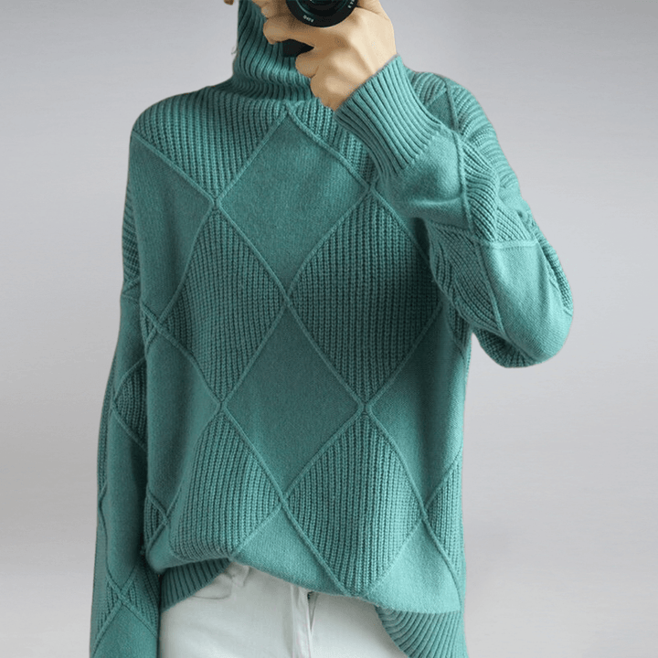 Relaxed fit women's turtleneck pullover. Soft, cozy knit sweater for comfortable everyday wear.