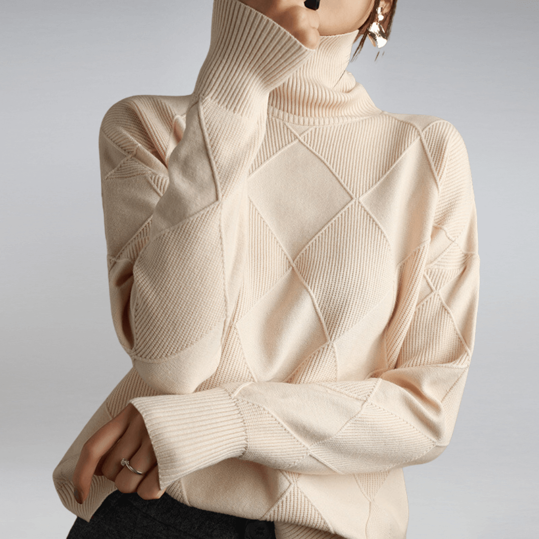 Warm women's turtleneck sweater with a relaxed fit. Effortless style for fall & winter comfort.