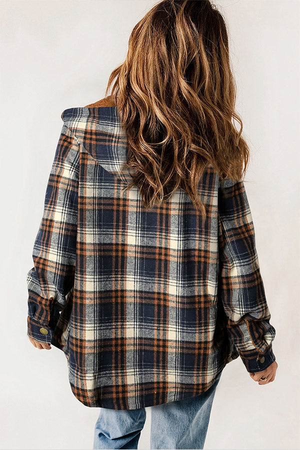 Plaid hooded flannel jacket for women, featuring a warm Sherpa lining and functional buttons.