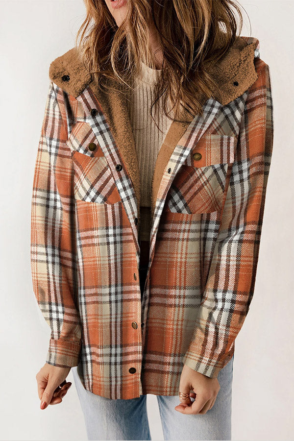 Soft Sherpa lined women's plaid flannel jacket, hooded and warm, ideal for chilly autumn days.