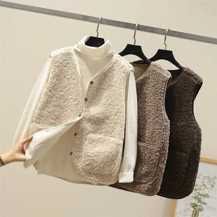 Must-have women's sherpa vest: button-front, V-neck, patch pockets. Essential fall & winter fashion.