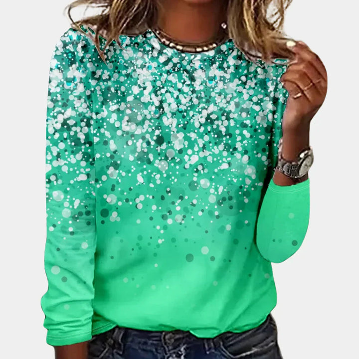 Festive long sleeve crew neck sweater with a charming snowflake design.