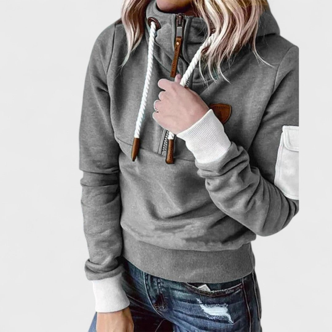 Back view of a women's soft green hoodie, casual and cozy. Comfortable pullover for loungewear.