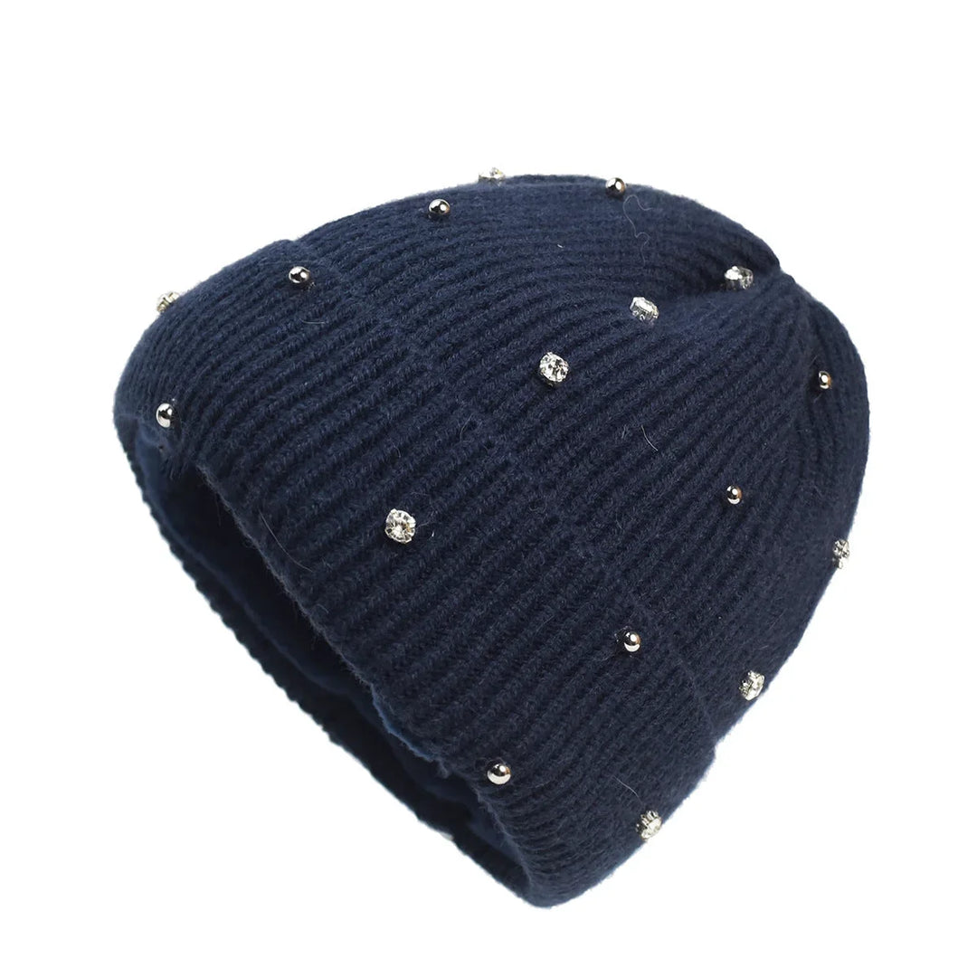 Women's cozy sparkle knit beanie with a stylish fold-over cuff, perfect for winter fashion and warmth.