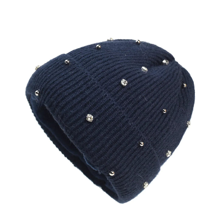 Women's cozy sparkle knit beanie with a stylish fold-over cuff, perfect for winter fashion and warmth.