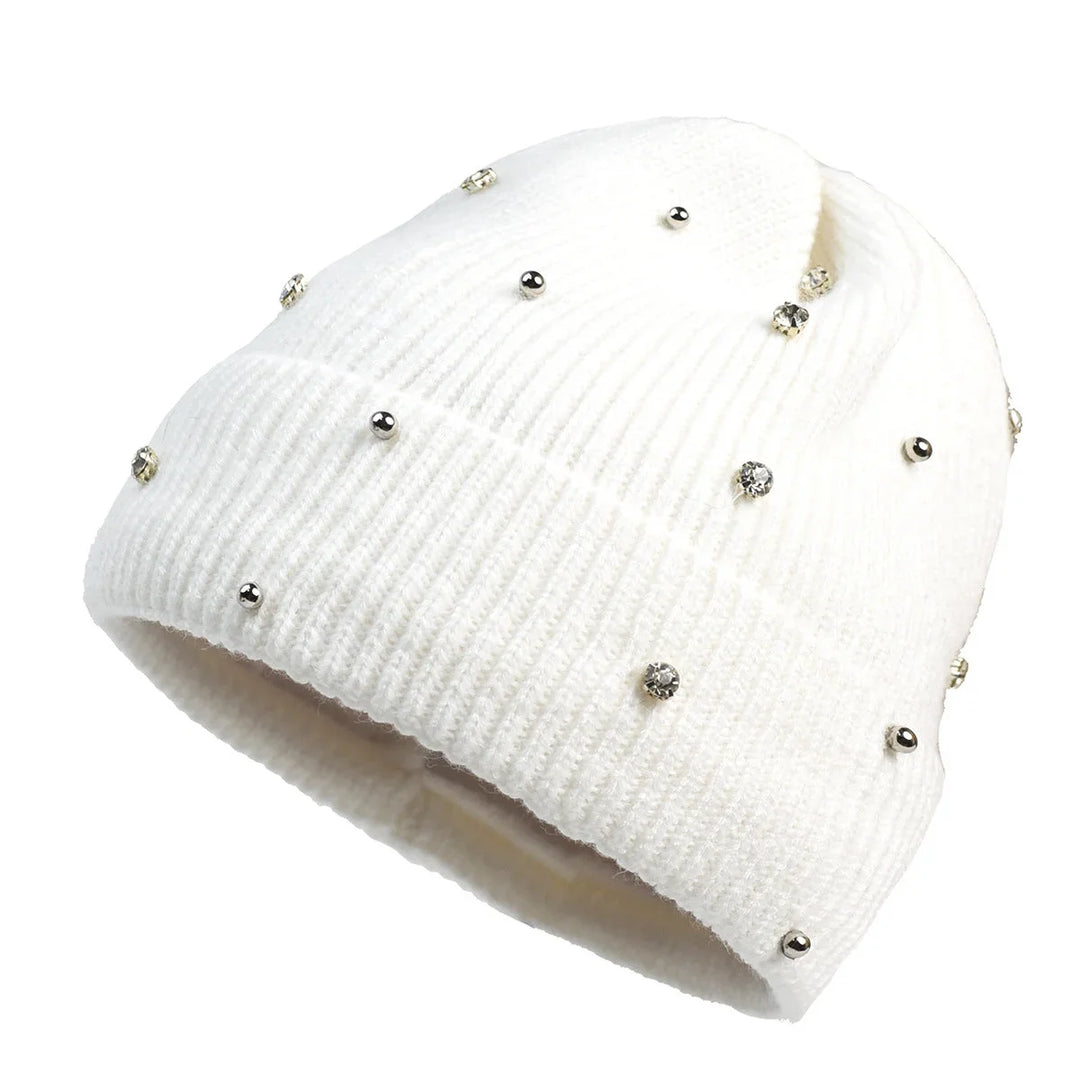 Comfortable women's beanie, a cozy knit hat offering warmth and style with its sparkle accents and fold-over cuff.
