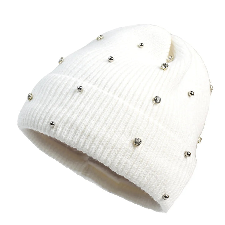 Comfortable women's beanie, a cozy knit hat offering warmth and style with its sparkle accents and fold-over cuff.