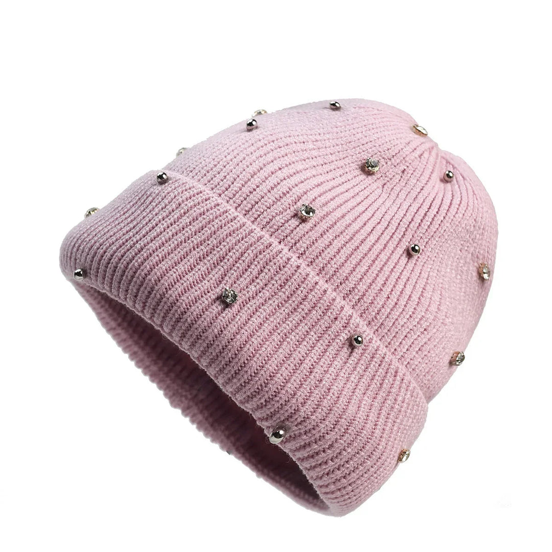 Warm & shiny women's beanie, a cozy knit hat with dazzling sparkle and a snug fold-over cuff for winter days.
