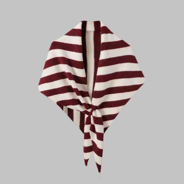 Women's cozy striped triangle shawl. Versatile fashion wrap for elegant layering.