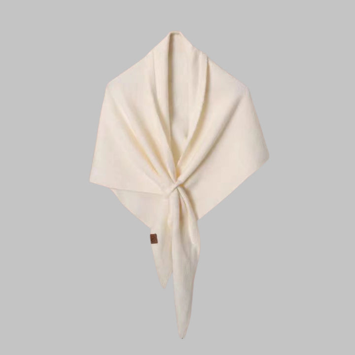 Women's elegant striped triangle shawl. Cozy layering wrap, a versatile fashion accessory.