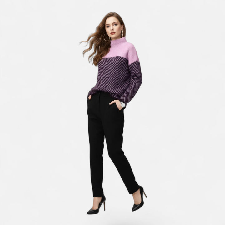 Fashionable women's long sleeve turtleneck sweater, great for everyday comfort and warmth.