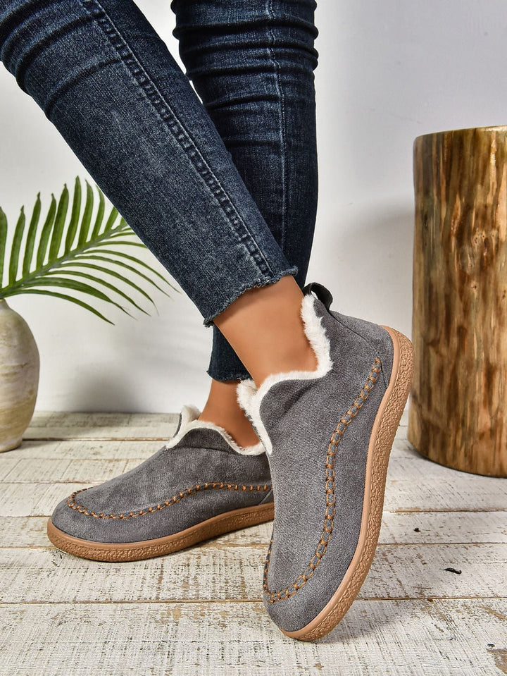Women's cozy warm lined slip-on slippers for ultimate comfort indoors.