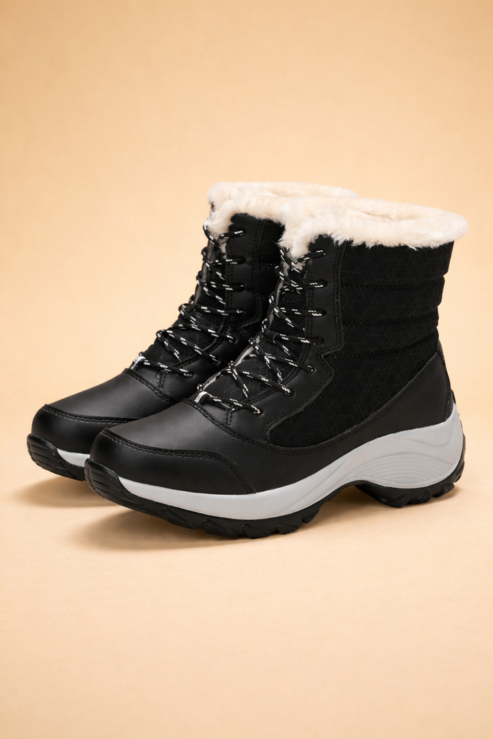 Durable women's platform winter boots, providing warmth & comfort for snowy conditions.