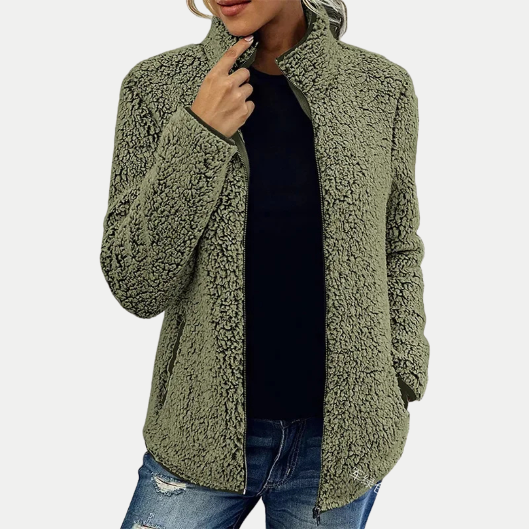 Comfortable women's zip-up fleece jacket with a soft textured pattern & practical side pockets.