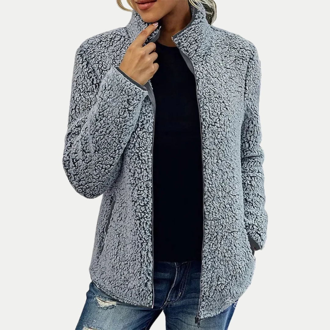Women's fall fashion zip-up jacket with a soft textured pattern, making it a versatile layering piece.