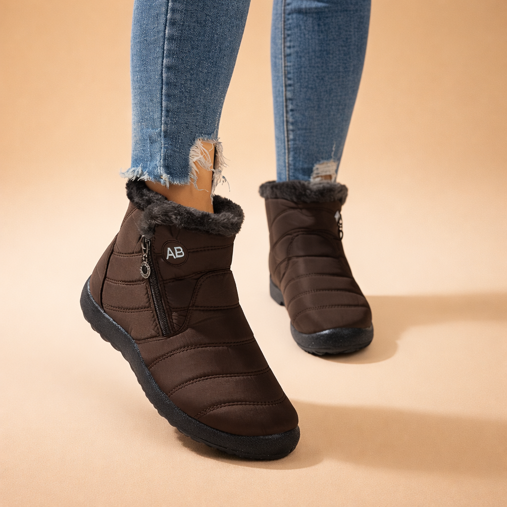 Comfortable women's fashion ankle boots. Cozy zip-up winter footwear for warmth and everyday style.