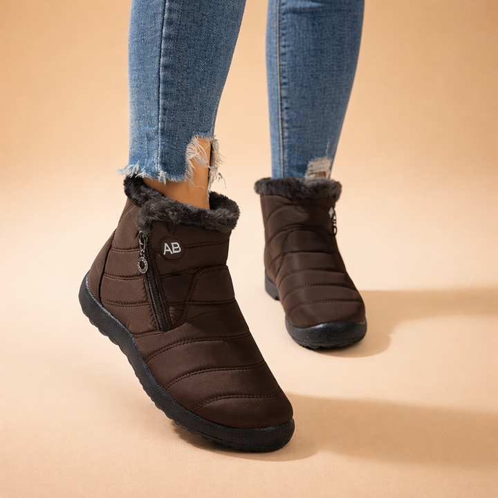 Comfortable women's fashion ankle boots. Cozy zip-up winter footwear for warmth and everyday style.