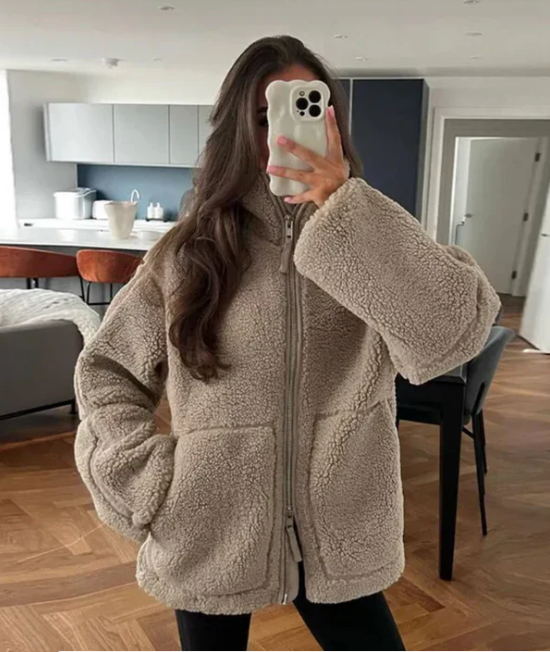Bronze women's cozy winter coat, a warm zip-up jacket perfect for stylish cold weather layering and everyday wear.