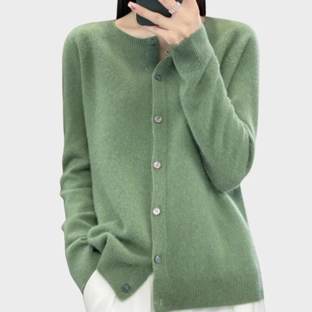 Women's cream crew-neck knit cardigan sweater with buttons, perfect for elegant layering or casual fall wear.
