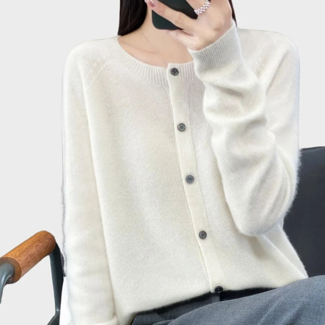 Soft knit women's crew-neck cardigan sweater, long sleeves and button front for a classic fall look.