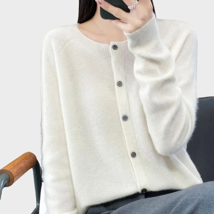 Soft knit women's crew-neck cardigan sweater, long sleeves and button front for a classic fall look.