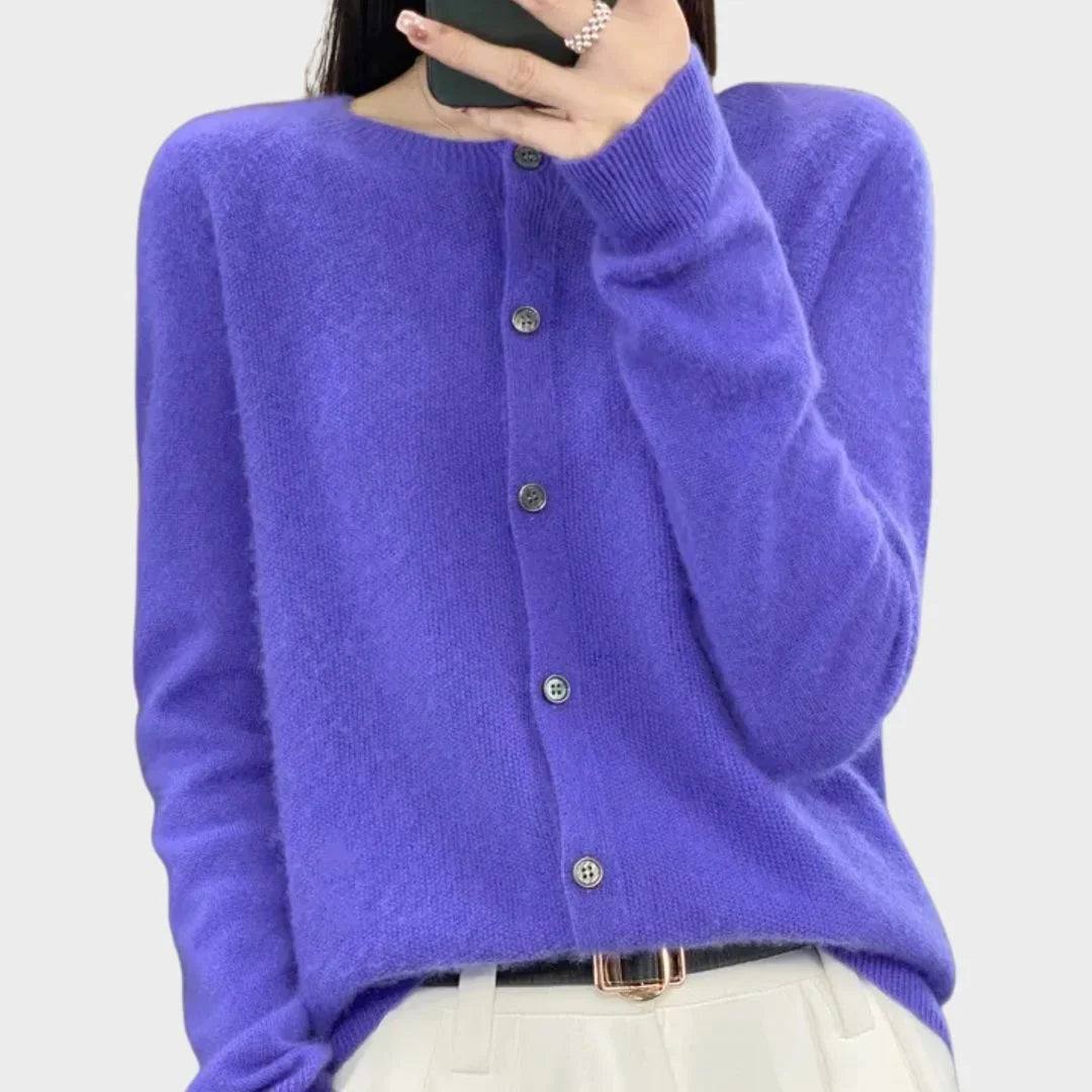 Modern women's knit button-up cardigan with crew neck, an essential layering sweater for any season.