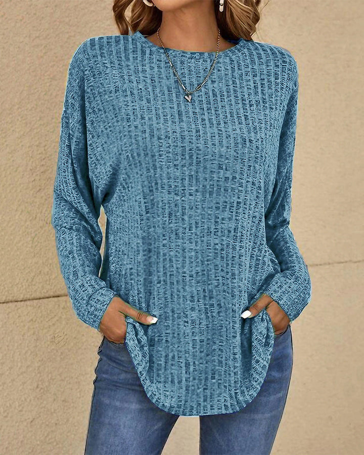 Women's crew neck long sleeve jumper in a soft, comfortable knit for everyday wear.