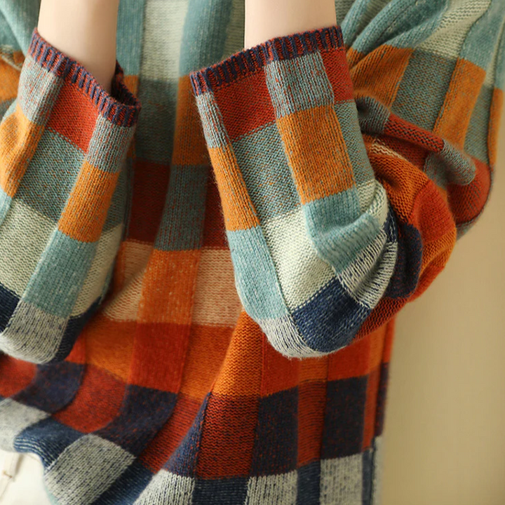 Chic women's crew neck sweater featuring a fashionable check pattern.