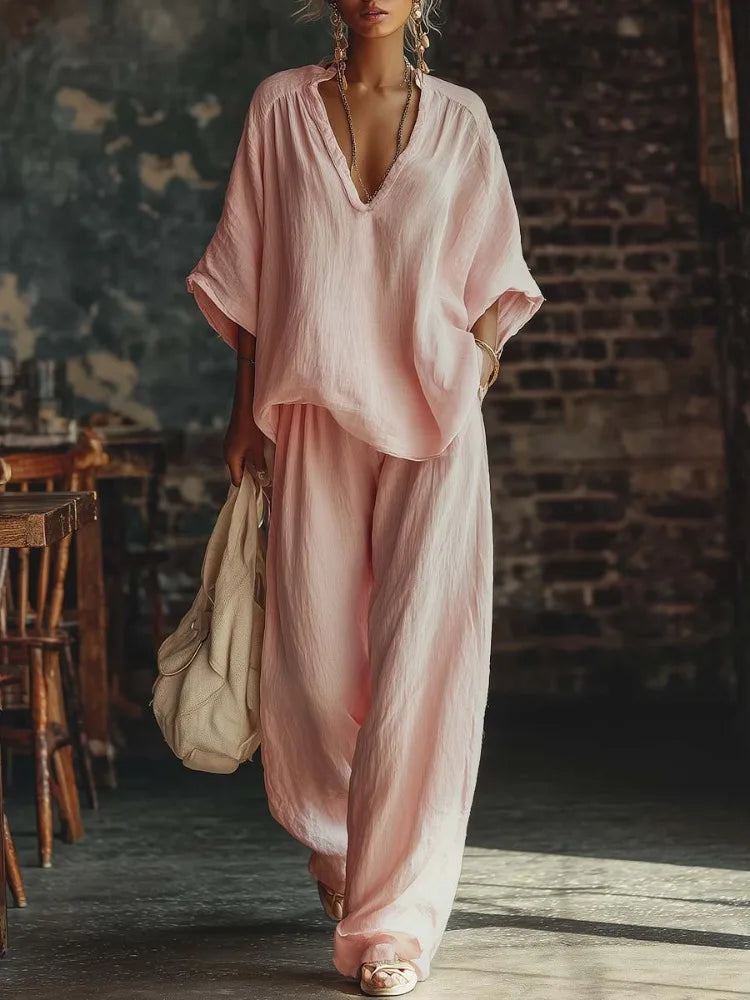 Women's crinkled plunging wide-leg lounge set. Comfortable two-piece for relaxed fit & casual style.