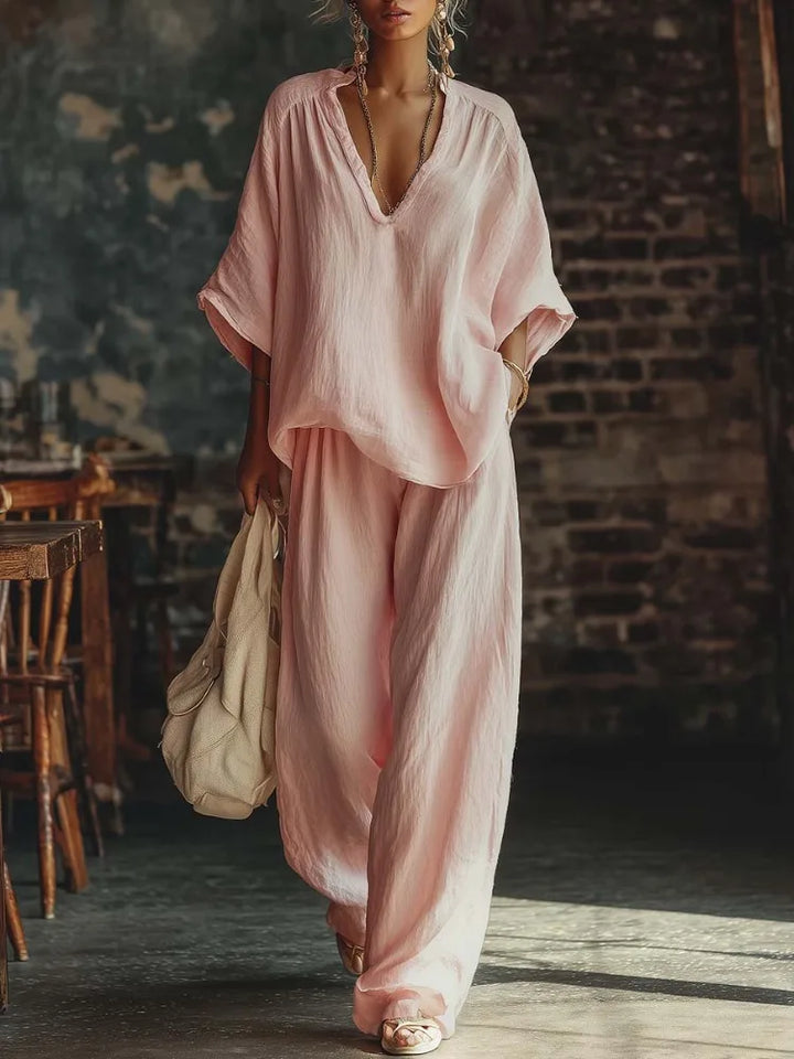 Women's crinkled plunging wide-leg lounge set. Comfortable two-piece for relaxed fit & casual style.