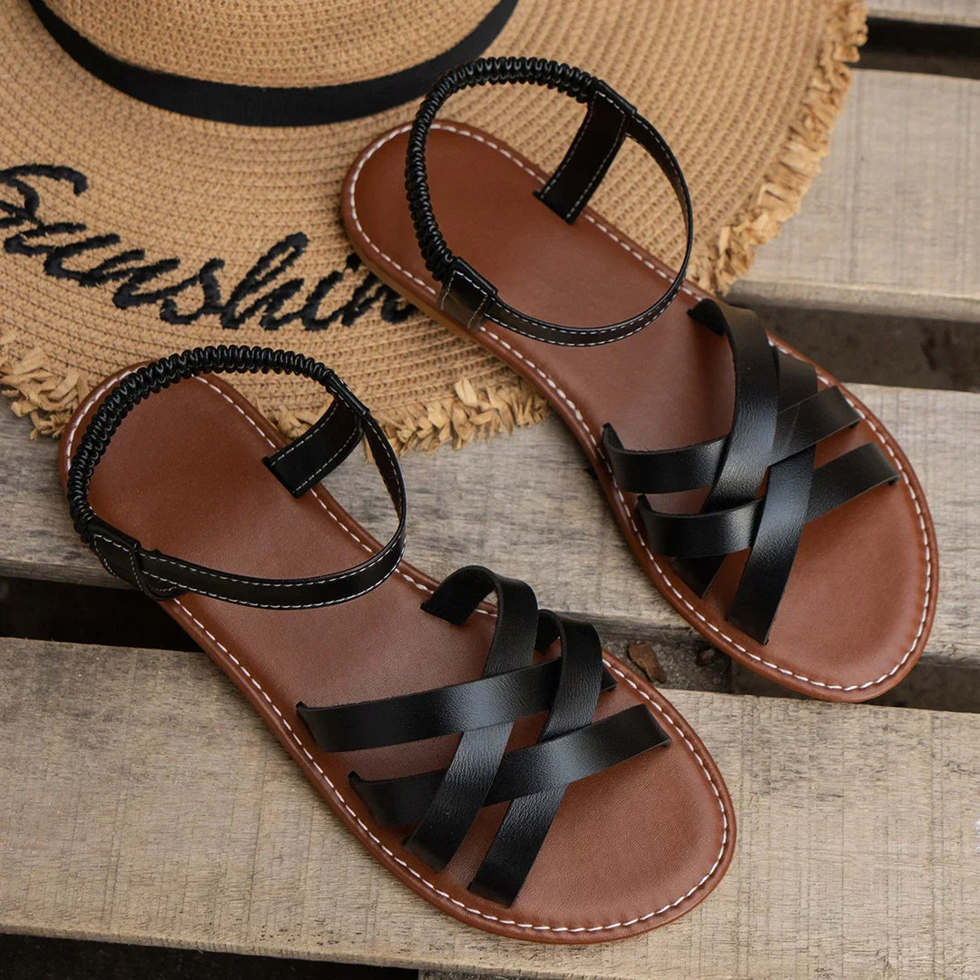 Stylish women's backband sandals, slip-on design with crisscross straps, great for everyday summer outfits.