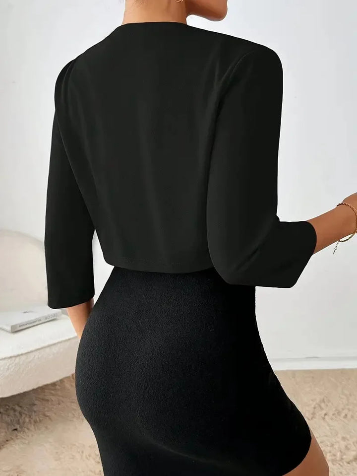 Professional women's open front pleated blazer with cropped 3/4 sleeves, perfect for office fashion.