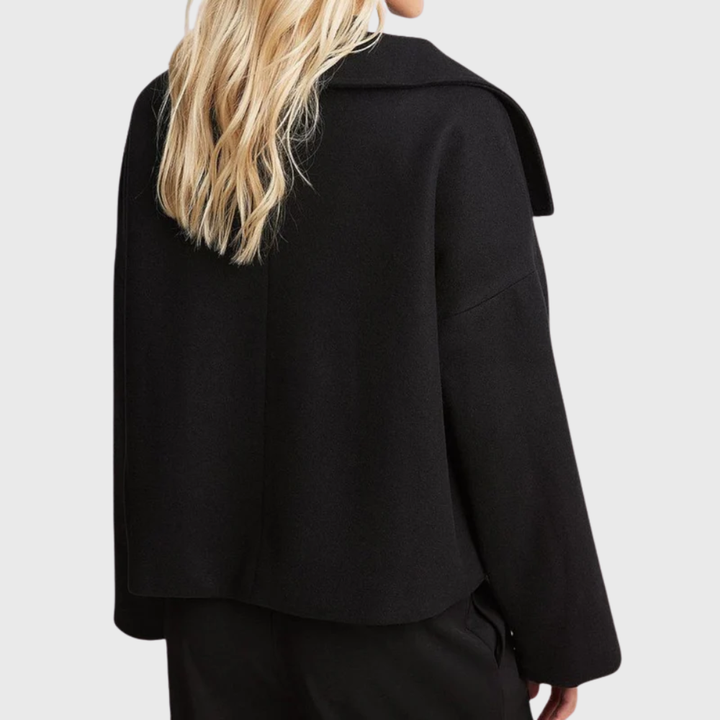 Women's fall fashion cropped double-breasted jacket, an elegant piece with a chic wide lapel detail.