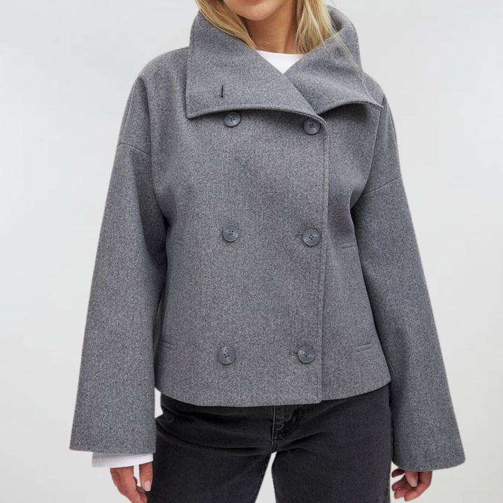 Women's stylish cropped double-breasted jacket, perfect for fall/winter with an elegant wide lapel.