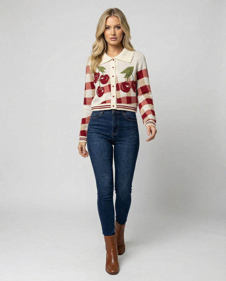 Women's cropped knit jacket with a vibrant cherry blossom floral print, perfect for spring style.