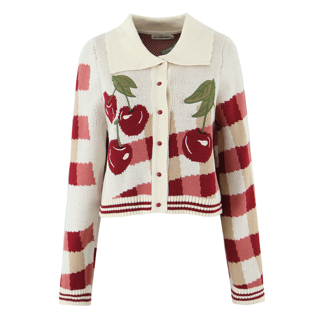 Soft knit cropped cardigan for women, adorned with a delicate cherry blossom floral design.