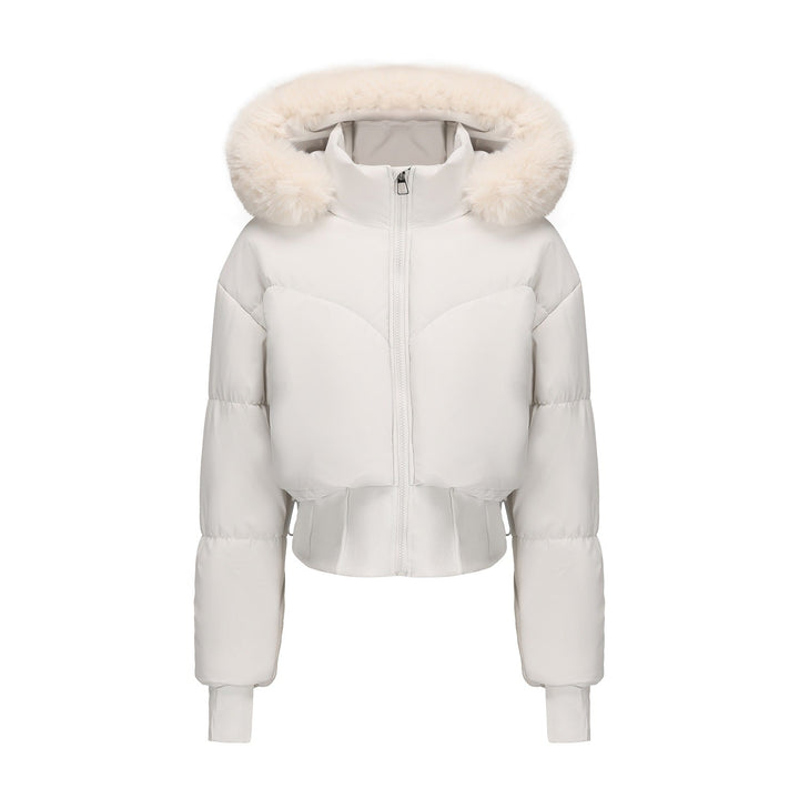 Fashionable women's cropped puffer jacket. Hooded winter coat with soft faux fur for warmth & style.