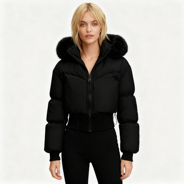 Stay warm in style with this women's cropped puffer jacket & faux fur hood, perfect for winter adventures.
