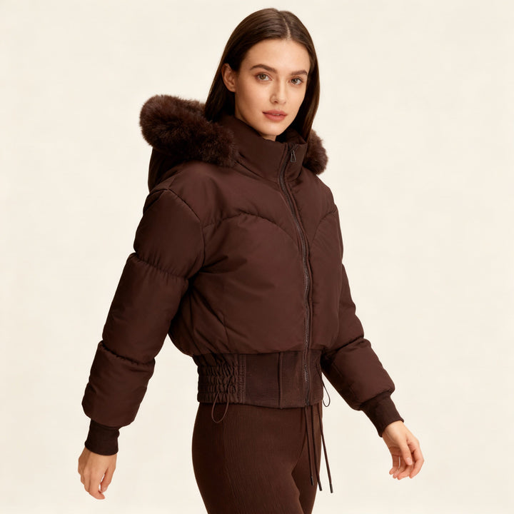 Versatile women's cropped puffer jacket with a stylish faux fur hood. A warm & trendy winter coat.
