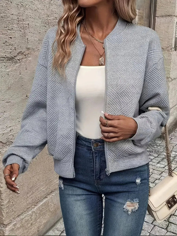 Women's cropped quilted zip-up bomber jacket, perfect for everyday casual wear & versatile layering.